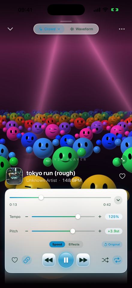 The Y2K Player speed panel over the Crowd visualizer &mdash; a floor of glossy smiling spheres under three beams of light &mdash; with Tempo at 125% and Pitch at +3.9st, on a track called "tokyo run (rough)" at 148 BPM.